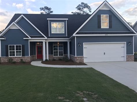 blue houses with red doors